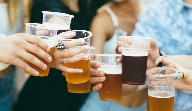 group of friends with beer or ale cropped